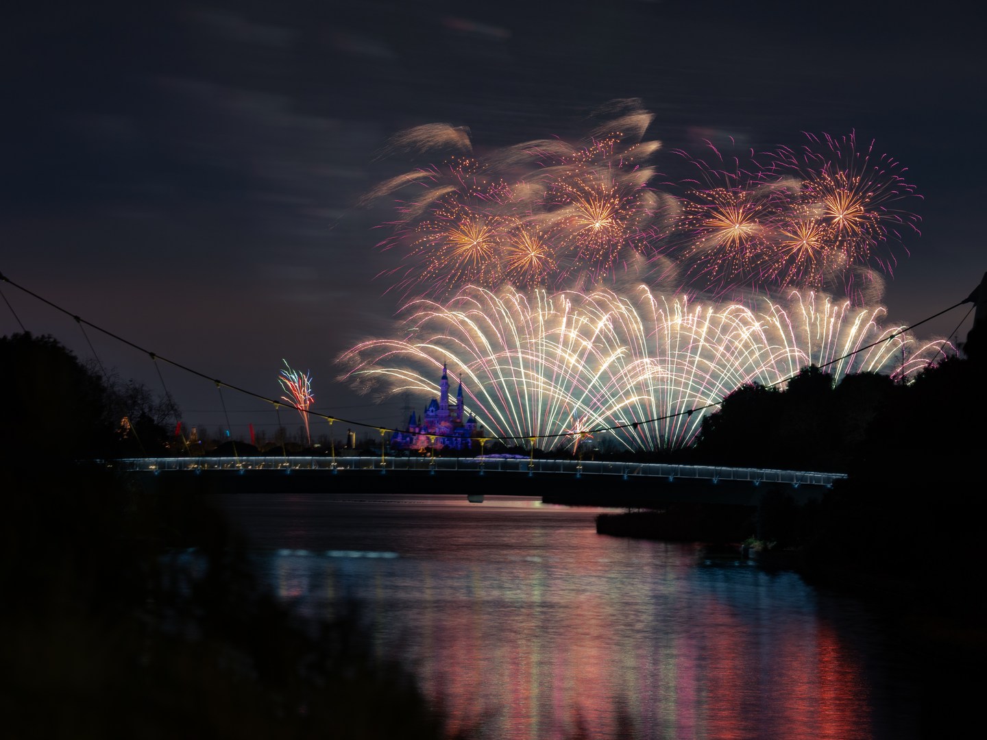 Fireworks reflected in the water after dark